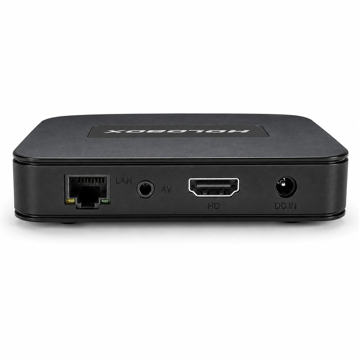 Close-up of Holobox Android TV Box with voice remote and ports