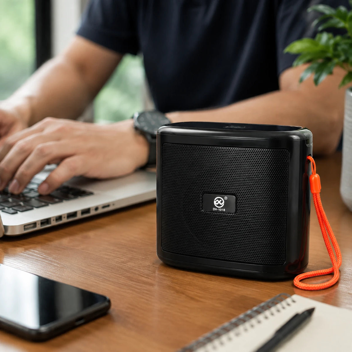 DV-1018 portable wireless speaker with wrist strap for easy carrying
