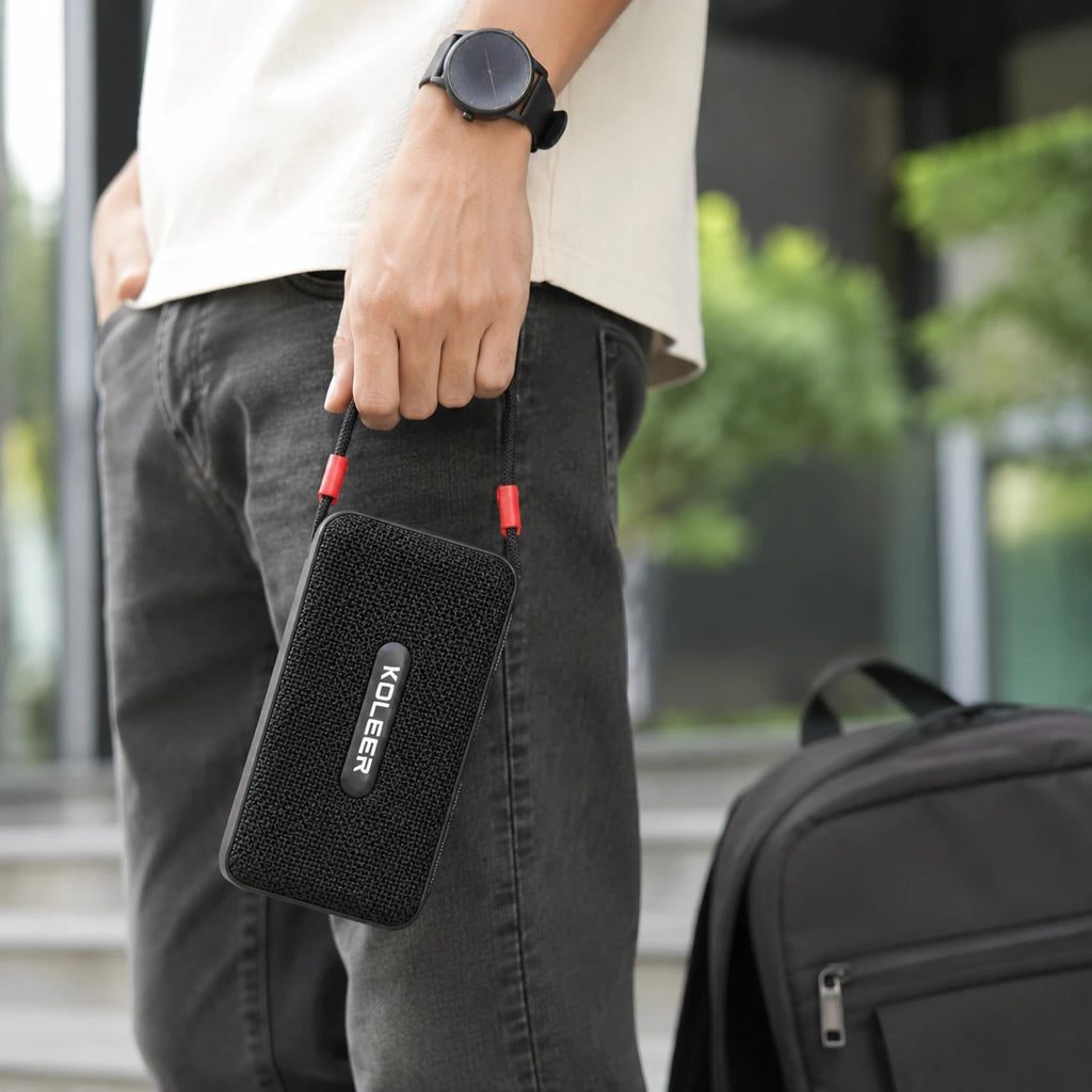 Portable wireless bass speaker with carry hook for convenient outdoor use